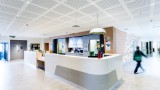 A long shot of the Werribee Mercy Hospital reception desk.